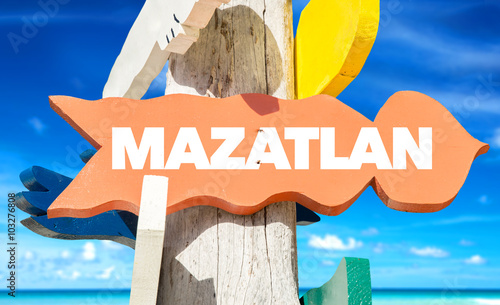 Mazatlan welcome sign with beach