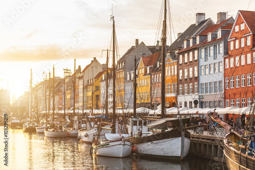 Colorful houses in Copenhagen old town at sunset