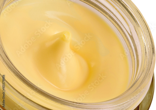 jar with a female face cream