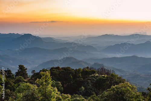 View of sunset over mountain range, mountain gap, mountain layer