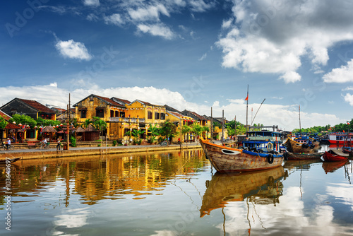 Wooden boats on the Thu Bon River in Hoi An, Vietnam