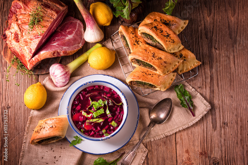 beet green soup with pastries