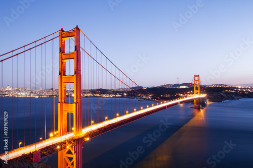 gold gate bridge in blue sky at dawn