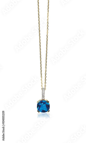 Blue sapphire gemstone birthstone necklace with diamonds isolated on white. Cushion cut stone