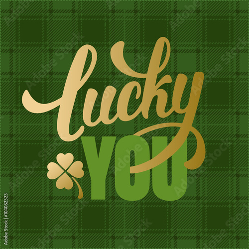 Calligraphic Inscription with Wishes a Lucky Day for You on Saint Patricks Day on Tartan Background. Shamrock - Talisman for Success, Wealth. Hand Drawn Lettering. Vector Illustration.