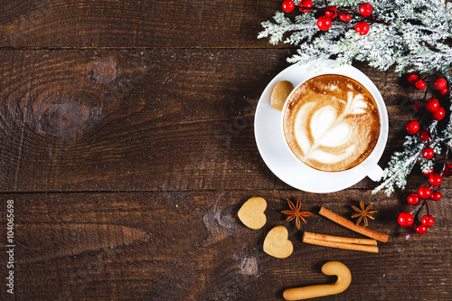 Christmas cookies and coffee on wooden table