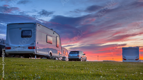 Caravans and cars sunset