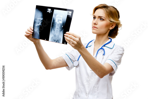 Woman doctor standing on white background