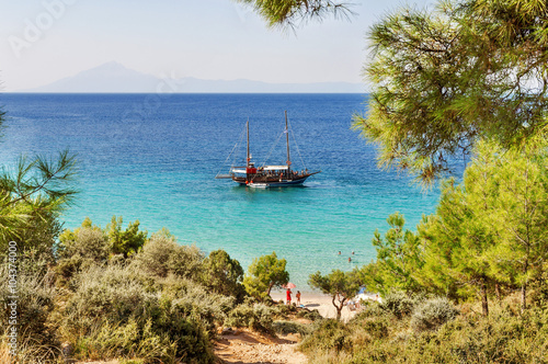 THASSOS GREECE, 03 SEPTEMBER 2016 Small beach Potos in Greek island Thassos, with boat on sea on 03 september on Thassos