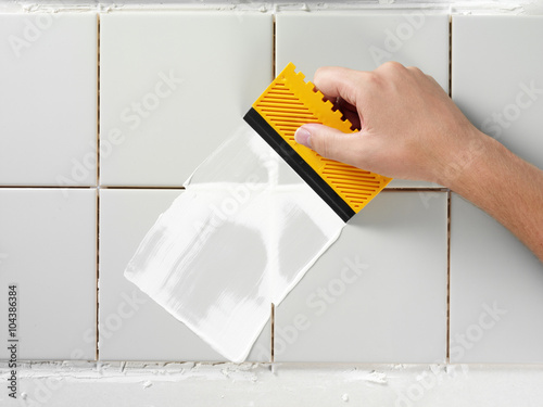 TILING AND GROUTING A WALL