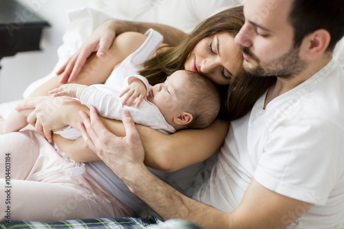 Happy family with newborn baby