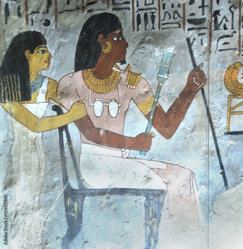 Ancient Egyptian painting of Senufer and his wife in the tombs of the Nobles
