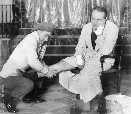 Man giving a massage to a boxer 