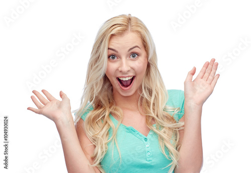 surprised smiling young woman or teenage girl