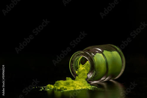 toxic green colorant powder in the jar