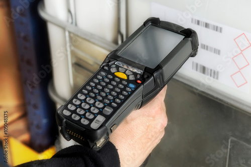 Person scanning a barcode with a scanner