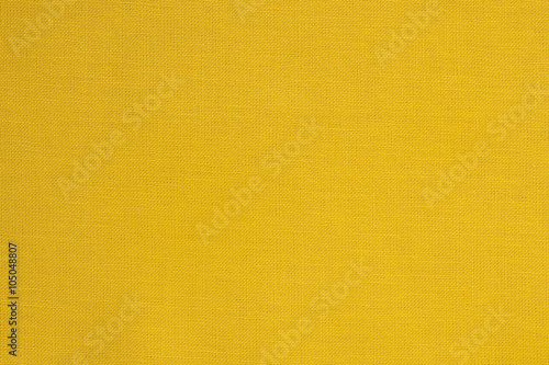 Close-up of a yellow fabric textile texture