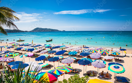 Crowds of tourists at Patong beach in Phuket, Thailand.