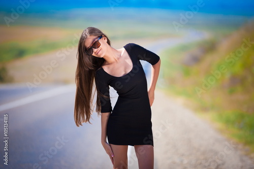brunette woman road