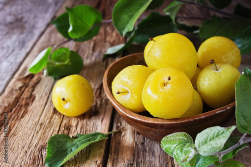 Ripe yellow plums