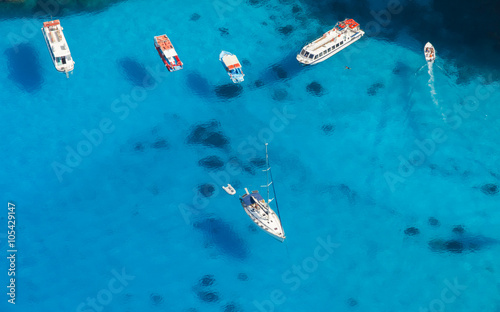 Aerial view of yachts in azure sea