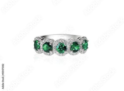 green emerald and diamond wedding band ring isolated on white