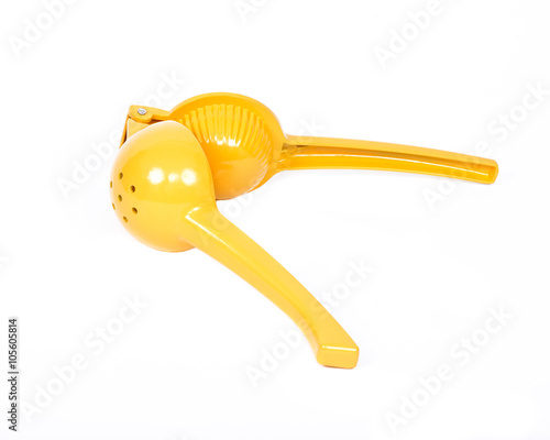 Yellow lemon squeezer separated on white background