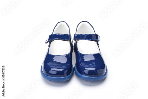 blue patent childrens shoe on a white background