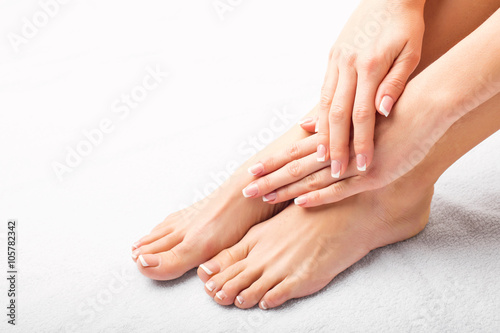 Woman after manicure and pedicure