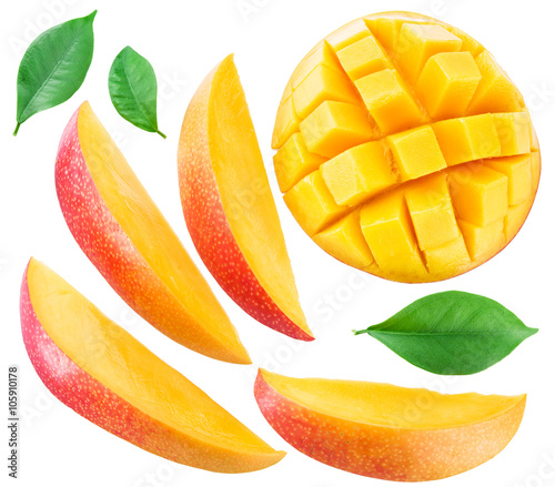 Slices of mango fruit and leaves over white. File contains clipp