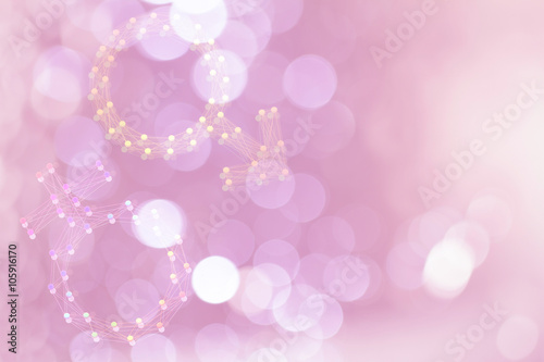 Blurred male female symbols on blurred pink bokeh background