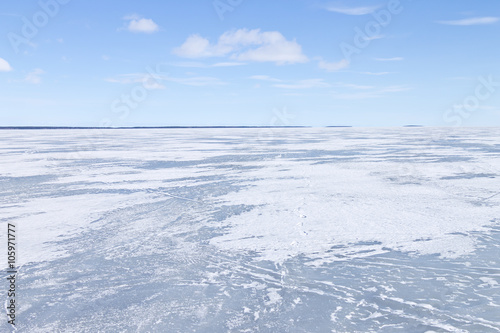 Frozen northern lake on a clear winter day