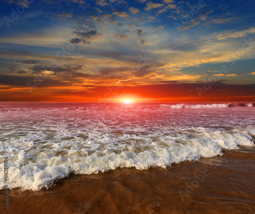 Majestic sunset over ocean shore