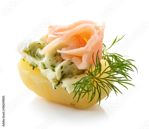 boiled potato decorated with dill and garlic butter and salmon