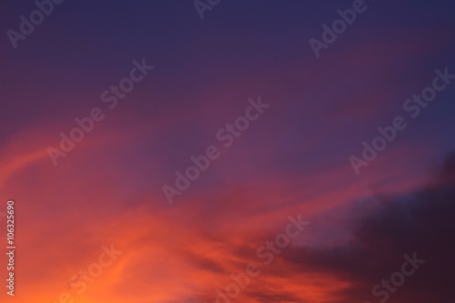 colorful dramatic sunset sky with orange cloud, twilight sky