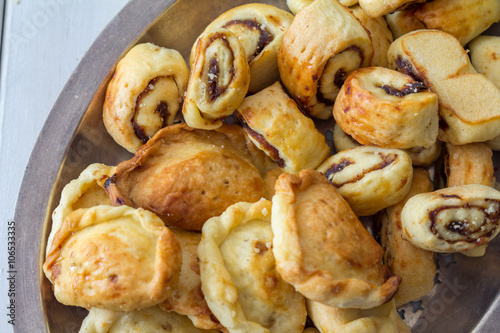 Klecha Iraqi Date Cookies with Dates from Above on a Platter