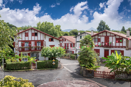 Traditional colorful half-timbered Labourdine houses in the village of Espelette, Basque country, France