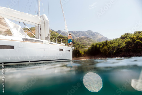 man yachting blue lagoon