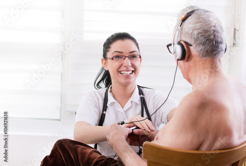 Nurse taking care od old man