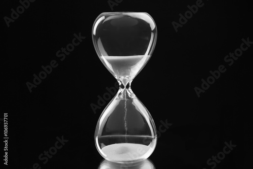 Hourglass on black background