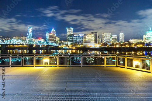 empty steel floor with cityscape and skyline of portland at nigh