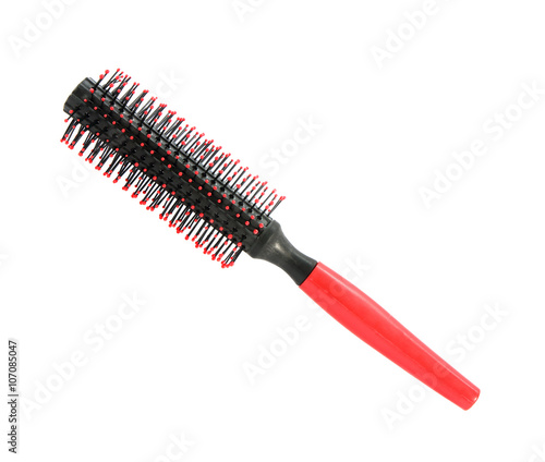 Massage round hairbrush comb isolated on white background