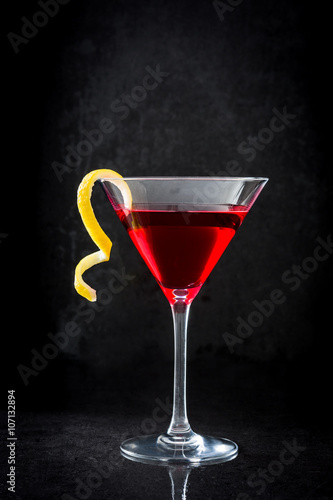 Cosmopolitan cocktail on black background 