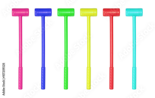Collection of large toy hammers isolated