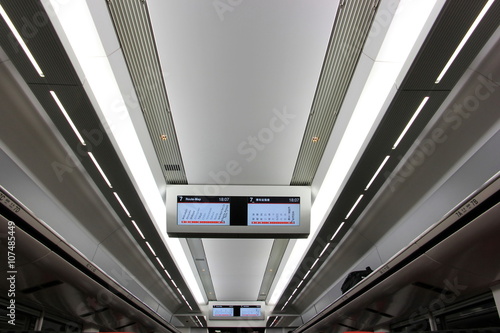 Digital schedule board on ceiling in Narita express train