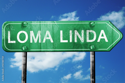 loma linda road sign , worn and damaged look