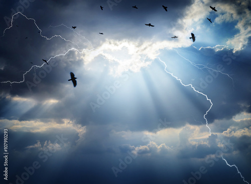 storm clouds, lightnings and ravens