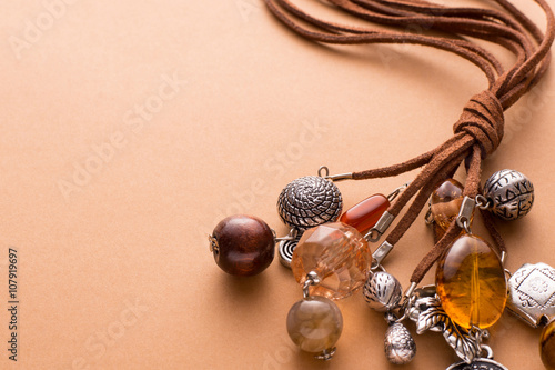 Necklace Made with Brown Leather and Silver Charms