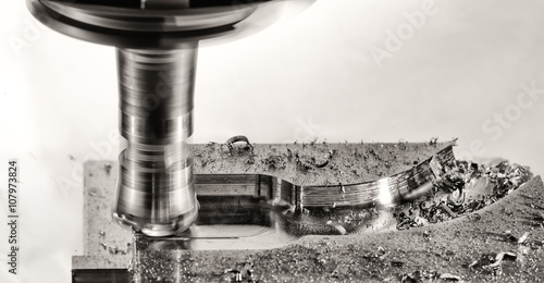 Milling cutter work with splinters flying off, monochrome versio