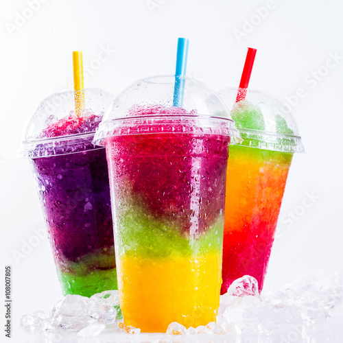 Frozen Rainbow Slush Drinks Chilling on Ice